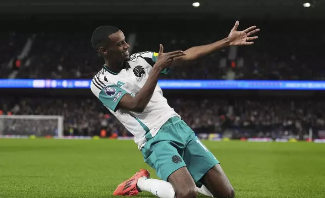 Newcastle United's Alexander Isak celebrates scoring during the English Premier League soccer match between Ipswich Town and Newcastle United at Portman Road, Ipswich, England, Saturday Dec. 21, 2024. (Bradley Collyer/PA via AP)