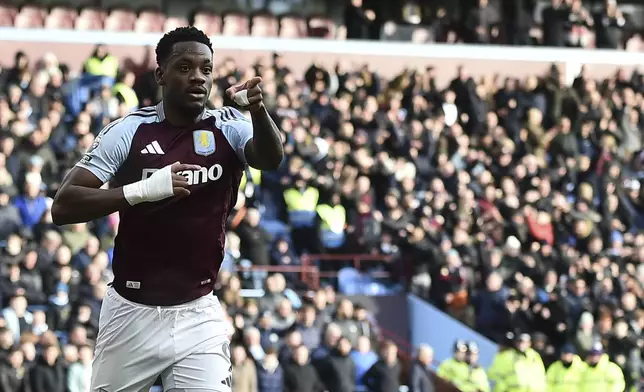 Aston Villa's Jhon Duran celebrates after scoring the opening goal during the English Premier League soccer match between Aston Villa and Manchester City, at Villa Park in Birmingham, England, Saturday, Dec. 21, 2024. (AP Photo/Rui Vieira)