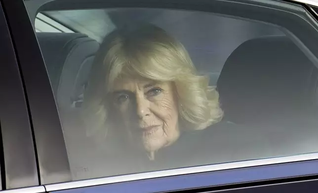 Britain's Queen Camilla arrives at Buckingham Palace in London, Tuesday, Dec. 3, 2024. (AP Photo/Alberto Pezzali)