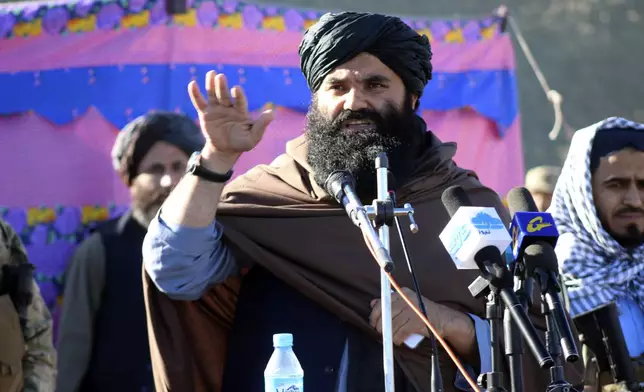 Acting interior minister Sirajuddin Haqqani, speaks during the funeral prayers of Khalil Haqqani, the minister for refugees and repatriation, during his funeral procession in eastern Paktia province, Afghanistan, Thursday, Dec. 12, 2024. (AP Photo/Saifullah Zahir)