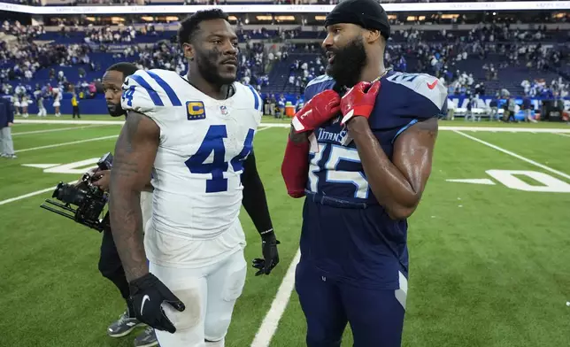 Indianapolis Colts linebacker Zaire Franklin (44) talks with Tennessee Titans cornerback Daryl Worley (35) after an NFL football game Sunday, Dec. 22, 2024, in Indianapolis. (AP Photo/Darron Cummings)