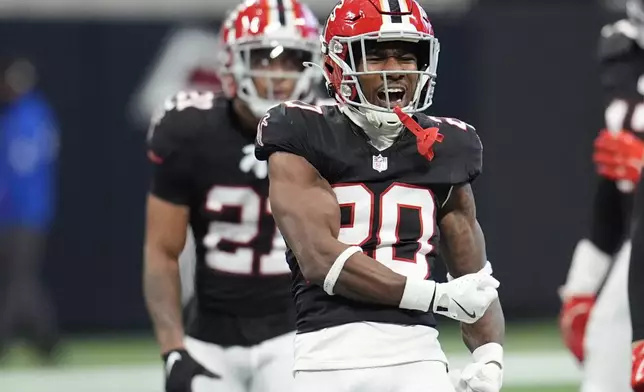 Atlanta Falcons cornerback Dee Alford (20) celebrates breaking up a pass in the second half of an NFL football game against the New York Giants in Atlanta, Sunday, Dec. 22, 2024. (AP Photo/Mike Stewart)