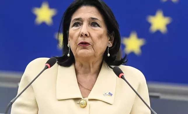 Georgian outgoing President Salome Zourabichvili delivers her speech at the European Parliament and appealed to the European Union to press her country's pro-Russia government to hold a new election amid a police crackdown on peaceful opposition protesters, Wednesday, Dec. 18, 2024 in Strasbourg, eastern France. (AP Photo/Pascal Bastien)