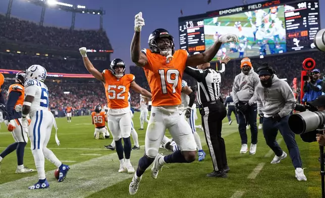 Denver Broncos' Marvin Mims Jr. celebrates after a long return during the second half of an NFL football game against the Indianapolis Colts Sunday, Dec. 15, 2024, in Denver. (AP Photo/Jack Dempsey)