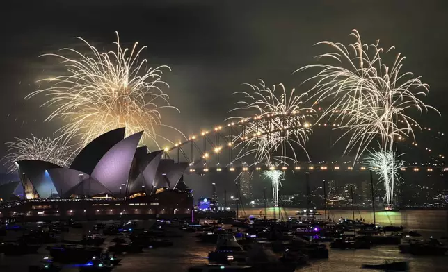 The 9pm fireworks are seen during New Year's Eve celebrations in Sydney, Australia, Tuesday, Dec. 31, 2024. (Bianca De Marchi/AAP Image via AP)