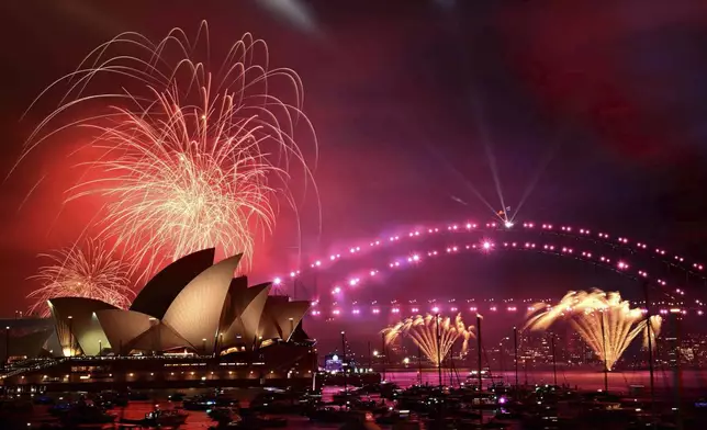 The 9pm fireworks are seen during New Year's Eve celebrations in Sydney, Australia, Tuesday, Dec. 31, 2024. (Bianca De Marchi/AAP Image via AP)