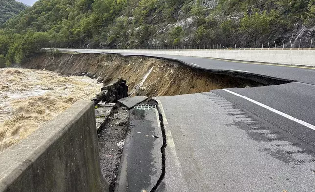 FILE - This photo provided by the North Carolina Department of Transportation shows the collapsed eastbound lane of I-40 into the Pigeon River in North Carolina near the Tennessee border, Sept. 28, 2024. (N.C. Department of Transportation via AP, File)