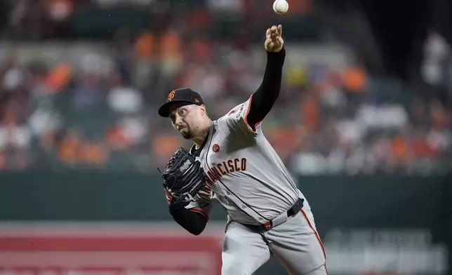 FILE - San Francisco Giants starting pitcher Blake Snell delivers during the first inning of a baseball game against the Baltimore Orioles, Sept. 17, 2024, in Baltimore. (AP Photo/Stephanie Scarbrough, File)