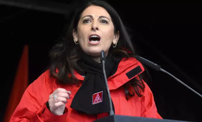 Daniela Cavallo, Chairwoman of the Volkswagen General Works Council, speaks at a rally during at nationwide warning Volkswagen workers' strike, on the grounds of the main Volkswagen plant in Wolfsburg, Germany, Monday, Dec. 2, 2024. (Julian Stratenschulte/Pool Photo via AP)