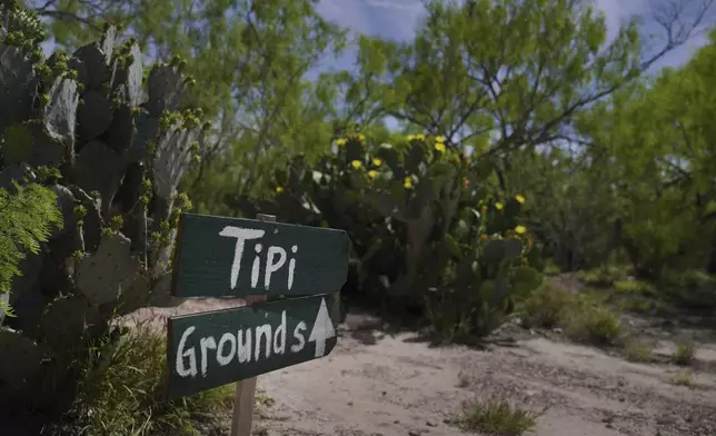 A sign leading to the tipi grounds at the Indigenous Peyote Conservation Initiative homesite in Hebbronville, Texas, Sunday, March 24, 2024. (AP Photo/Jessie Wardarski)