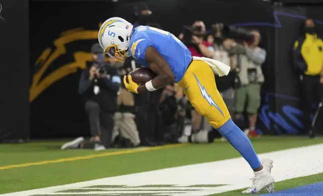 Los Angeles Chargers wide receiver Joshua Palmer (5) catches the ball in the end zone for a two-point conversion during the second half an NFL football game against the Denver Broncos, Thursday, Dec. 19, 2024, in Inglewood, Calif. (AP Photo/Eric Thayer)