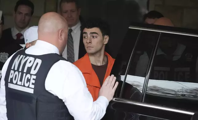 Luigi Nicholas Mangione leaves at Blair County Courthouse in Hollidaysburg, Pa., Thursday, Dec. 19, 2024. (AP Photo/Gene J. Puskar, Pool)