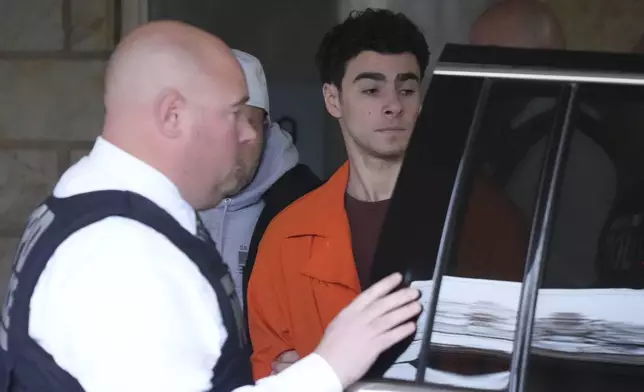 Luigi Nicholas Mangione leaves at Blair County Courthouse in Hollidaysburg, Pa., Thursday, Dec. 19, 2024. (AP Photo/Gene J. Puskar, Pool)