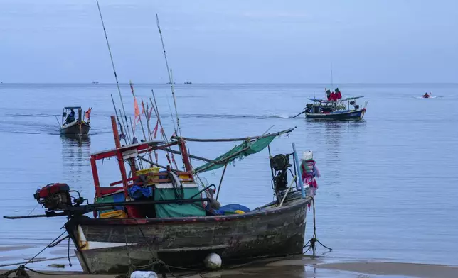 A fishing boat is back on shore at Ban Nam Khem, where tsunami hit 2004, Takuapa district of Phang Nga province, southern Thailand, Monday, Dec. 9, 2024. (AP Photo/Sakchai Lalit)