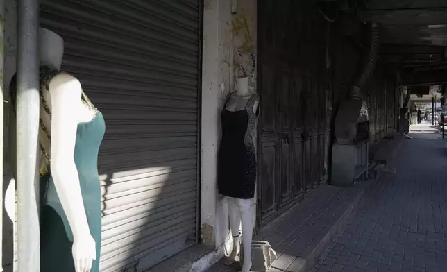 Closed shops during a general strike called as Palestinian security forces mount a major raid against militants in the Jenin refugee camp in the Israeli-occupied West Bank, Monday, Dec. 23, 2024. (AP Photo/Majdi Mohammed)