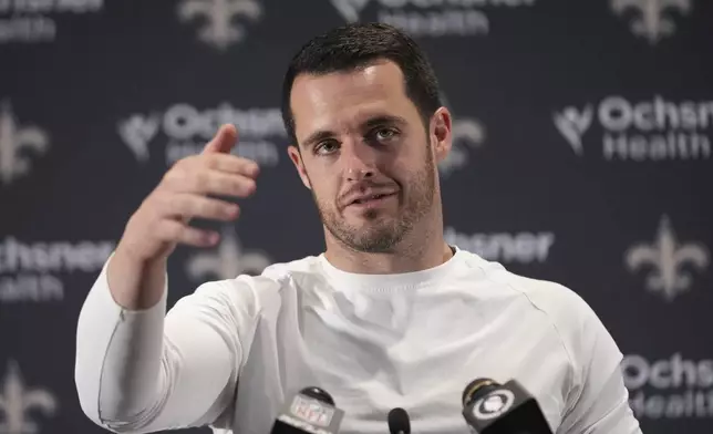 New Orleans Saints quarterback Derek Carr speaks during a news conference after an NFL football game against the Cleveland Browns in New Orleans, Sunday, Nov. 17, 2024. (AP Photo/Gerald Herbert)