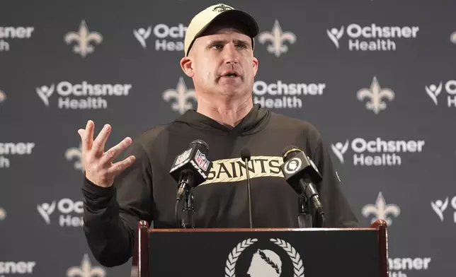 New Orleans Saints interim head coach Darren Rizzi answers questions after an NFL football game against the Los Angeles Rams, Sunday, Dec. 1, 2024, in New Orleans. (AP Photo/Gerald Herbert)