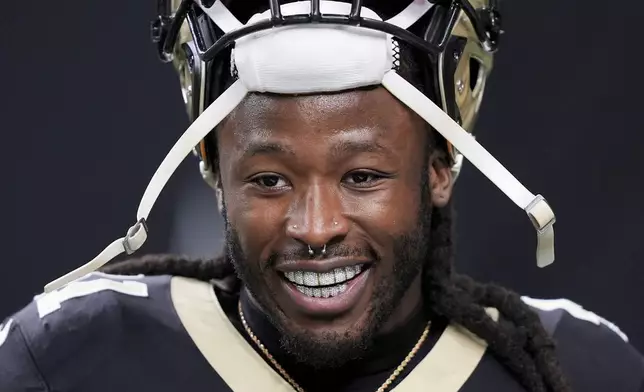 New Orleans Saints running back Alvin Kamara (41) smiles during warm ups before an NFL football game against the Los Angeles Rams, Sunday, Dec. 1, 2024, in New Orleans. (AP Photo/Gerald Herbert)