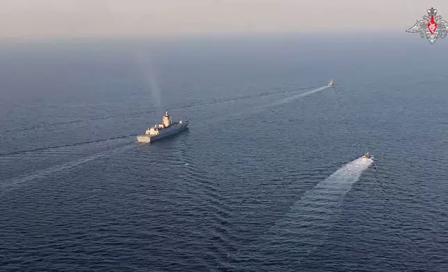 In this photo taken from video released by Russian Defense Ministry Press Service on Tuesday, Dec. 3, 2024, a Russian navy frigate is seen during drills in the Mediterranean Sea. (Russian Defense Ministry Press Service photo via AP)