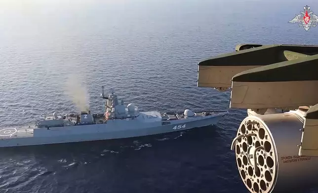 In this photo taken from video released by Russian Defense Ministry Press Service on Tuesday, Dec. 3, 2024, the Admiral Gorshkov frigate of the Russian navy is seen during drills in the Mediterranean Sea. (Russian Defense Ministry Press Service photo via AP)