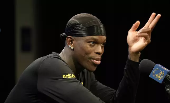 Golden State Warriors guard Dennis Schroder speaks at a news conference at the NBA basketball team's facility in San Francisco, Tuesday, Dec. 17, 2024. (AP Photo/Jeff Chiu)