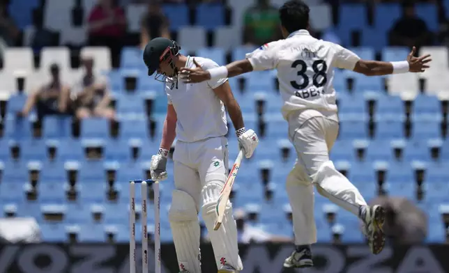 South Africa's David Bedingham is dismissed by Pakistan's Mohammad Abbas, for 14 runs during day four of the Test cricket match between South Africa and Pakistan, at the Centurion Park in Centurion, South Africa, Sunday, Dec. 29, 2024. (AP Photo/Themba Hadebe)