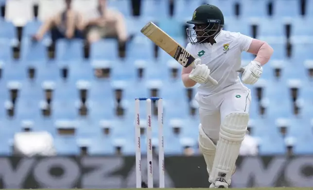 South Africa's Temba Bavuma makes a run during day four of the Test cricket match between South Africa and Pakistan, at the Centurion Park in Centurion, South Africa, Sunday, Dec. 29, 2024. (AP Photo/Themba Hadebe)