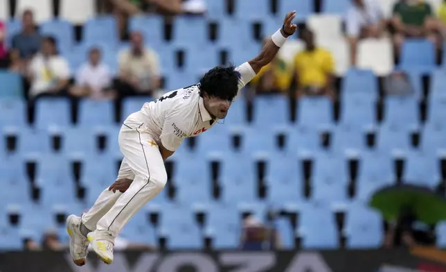 Pakistan's Naseem Shah follows through his delivery during day four of the Test cricket match between South Africa and Pakistan, at the Centurion Park in Centurion, South Africa, Sunday, Dec. 29, 2024. (AP Photo/Themba Hadebe)