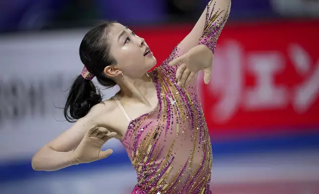 Mone Chiba, of Japan, competes in the women's short program segment at the ISU Grand Prix Finals of Figure Skating, Thursday, Dec. 5, 2024, in Grenoble, France. (AP Photo/Laurent Cipriani)