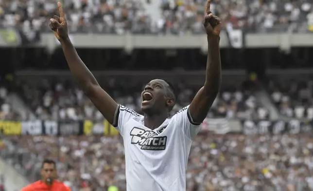 Luiz Henrique of Brazil's Botafogo celebrates after scoring his side's opening goal against Brazil's Atletico Mineiro during a Copa Libertadores final soccer match at Monumental stadium in Buenos Aires, Argentina, Saturday, Nov. 30, 2024. (AP Photo/Gustavo Garello)