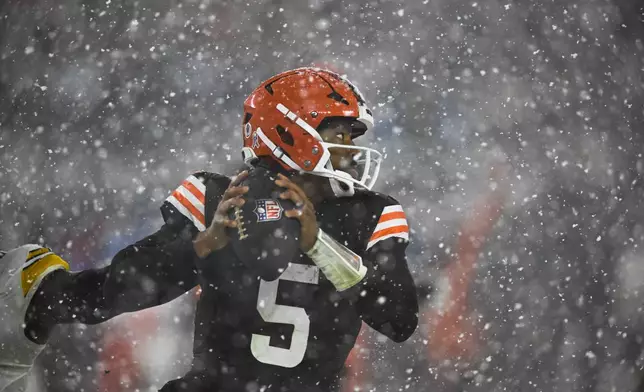 Cleveland Browns quarterback Jameis Winston (5) scrambles in the second half of an NFL football game against the Pittsburgh Steelers, Thursday, Nov. 21, 2024, in Cleveland. (AP Photo/David Richard)