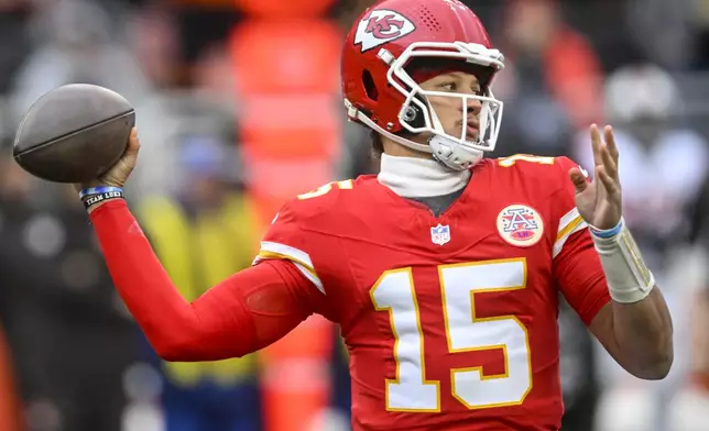 Kansas City Chiefs quarterback Patrick Mahomes (15) passes from the pocket against the Cleveland Browns during the first half of an NFL football game, Sunday, Dec. 15, 2024, in Cleveland. (AP Photo/David Richard)