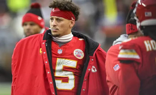 Kansas City Chiefs quarterback Patrick Mahomes watches play during the second half of an NFL football game against the Cleveland Browns, Sunday, Dec. 15, 2024, in Cleveland. (AP Photo/David Richard)