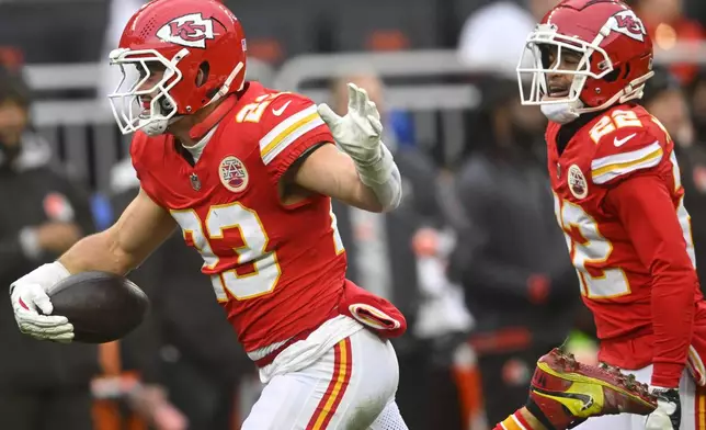 Kansas City Chiefs linebacker Drue Tranquill (23) celebrates his fumble recovery against the Cleveland Browns during the second half of an NFL football game, Sunday, Dec. 15, 2024, in Cleveland. (AP Photo/David Richard)