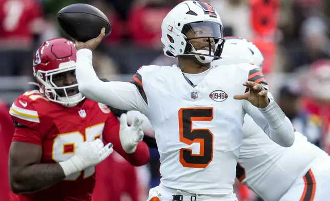 Cleveland Browns quarterback Jameis Winston (5) passes under pressure against the Kansas City Chiefs during the first half of an NFL football game, Sunday, Dec. 15, 2024, in Cleveland. (AP Photo/Sue Ogrocki)