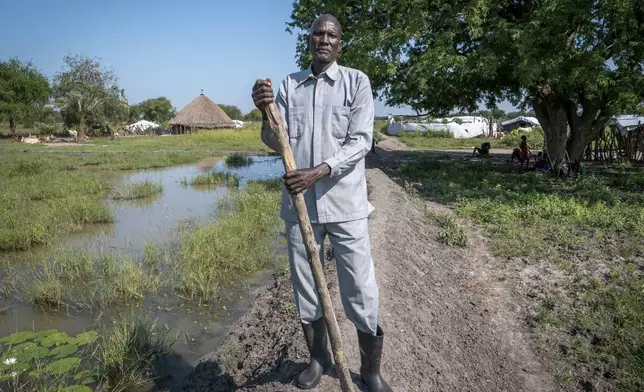 Gatluok Chuol Dong, 45 years, pose for a photo in Jonglei state, South Sudan, Thursday, Nov. 14, 2024. (AP Photo/Florence Miettaux)