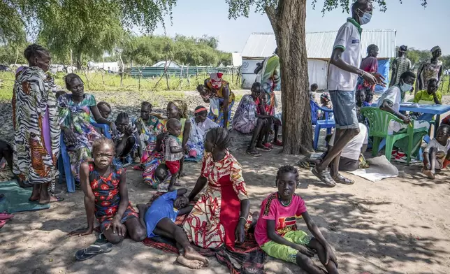 Patients wait to be treated at Paguong Primary Health Care Center (PHCC) in Jonglei state, South Sudan, Thursday, Nov. 14, 2024. (AP Photo/Florence Miettaux)