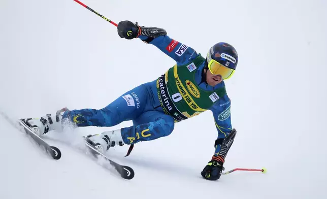 FILE - United States' Ted Ligety competes during the first run of an alpine ski, World Cup men's giant slalom in Santa Caterina Valfurva, Italy, Monday, Dec. 7, 2020. (AP Photo/Gabriele Facciotti, File)