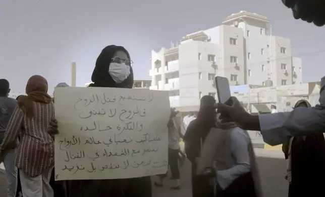 This image released by MAD Distribution shows a scene from "Sudan, Remember Us." (MAD Distribution via AP)