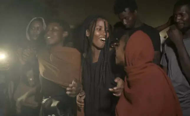 This image released by MAD Distribution shows a scene from "Sudan, Remember Us." (MAD Distribution via AP)