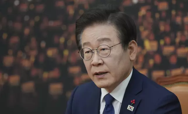 South Korea's main opposition Democratic Party leader Lee Jae-myung speaks during an interview with The Associated Press at the National Assembly in Seoul, South Korea, Friday, Dec. 6, 2024. (AP Photo/Lee Jin-man)