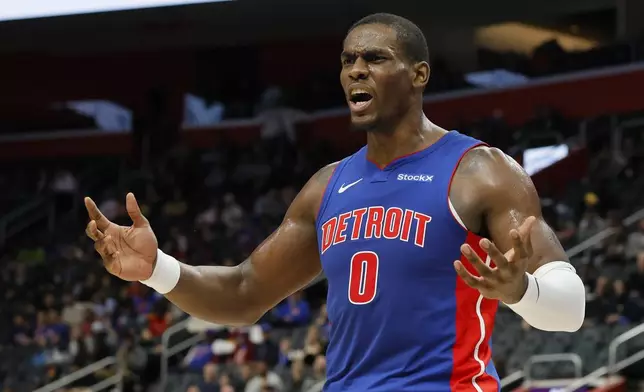 Detroit Pistons center Jalen Duren reacts after being whistled for fouling Miami Heat forward Jimmy Butler on a dunk during the first half of an NBA basketball game Monday, Dec. 16, 2024, in Detroit. (AP Photo/Duane Burleson)