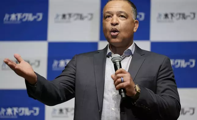 Los Angeles Dodgers manager Dave Roberts attends a press conference on the commercials he appears in Wednesday, Dec. 4, 2024, in Tokyo. (AP Photo/Eugene Hoshiko)