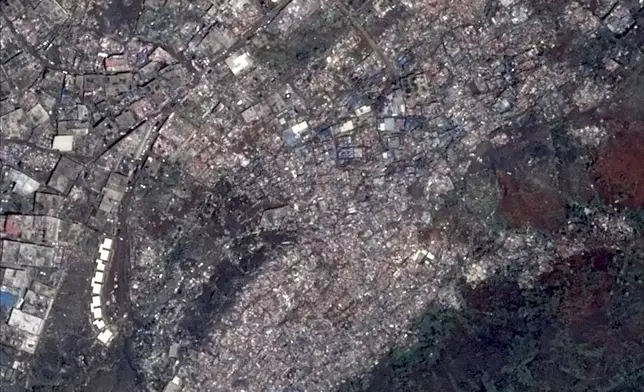 This satellite photo provided on Wednesday Dec. 18, 2024 by the Centre National d'Etudes Spatiales (CNES) shows Bandrajou in the Indian Ocean the French territory of Mayotte, on Dec.15, 2024, after the cyclone Chido. (CNES distributed by Airbus DS via AP)