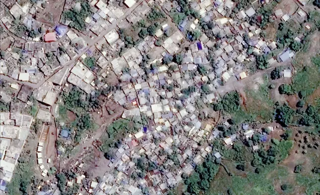 This undated satellite photo provided on Wednesday Dec. 18, 2024 by the Institut Geographique National (IGN) shows Bandrajou, in the Indian Ocean French territory of Mayotte, before the cyclone Chido. (IGN via AP)