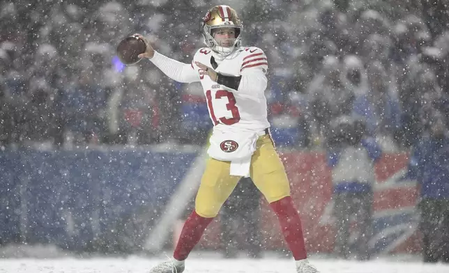 San Francisco 49ers quarterback Brock Purdy (13) passes against the Buffalo Bills during the second half of an NFL football game in Orchard Park, N.Y., Sunday, Dec. 1, 2024. (AP Photo/Adrian Kraus)