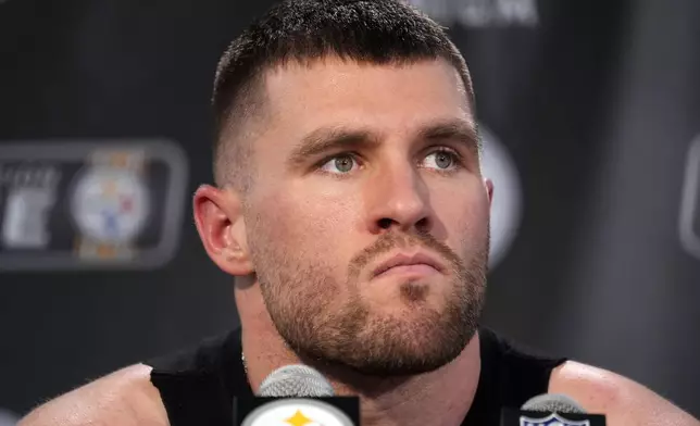 Pittsburgh Steelers linebacker T.J. Watt listens to a reporter's question following an NFL football game against the Kansas City Chiefs, Wednesday, Dec. 25, 2024, in Pittsburgh. (AP Photo/Gene J. Puskar)