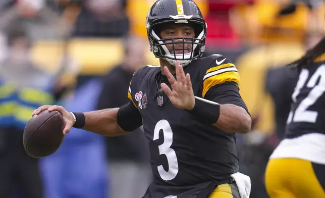 Pittsburgh Steelers quarterback Russell Wilson (3) passes in the pocket against the Kansas City Chiefs during the first half of an NFL football game, Wednesday, Dec. 25, 2024, in Pittsburgh. (AP Photo/Gene J. Puskar)