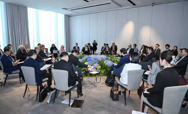 In this handout photo provided by Thailand Foreign Ministry, participants attend the Consultation amongst ASEAN Member States on Myanmar in Bangkok, Friday, Dec. 20, 2024. (Thailand Foreign Ministry via AP)