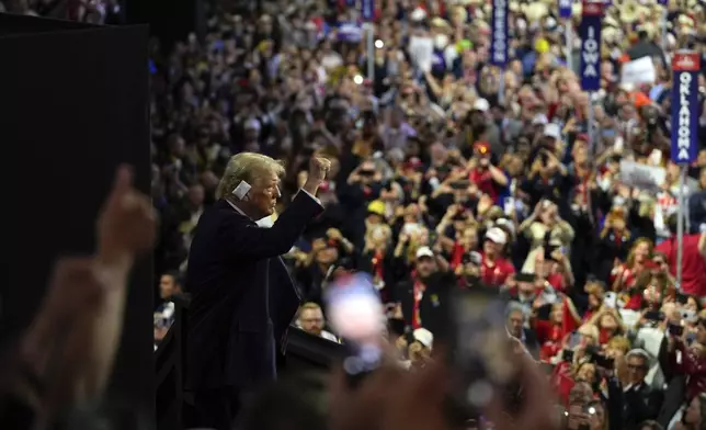 Republican presidential candidate former President Donald Trump gestures as he arrives at the Republican National Convention Wednesday, July 17, 2024, in Milwaukee. (AP Photo/Julia Demaree Nikhinson)